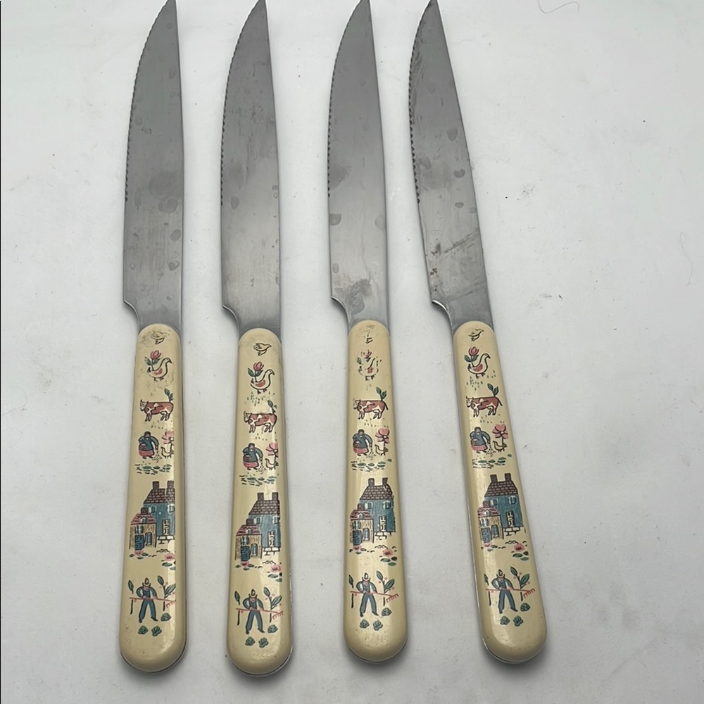 Cream Flatware Set with Ornate Handles
